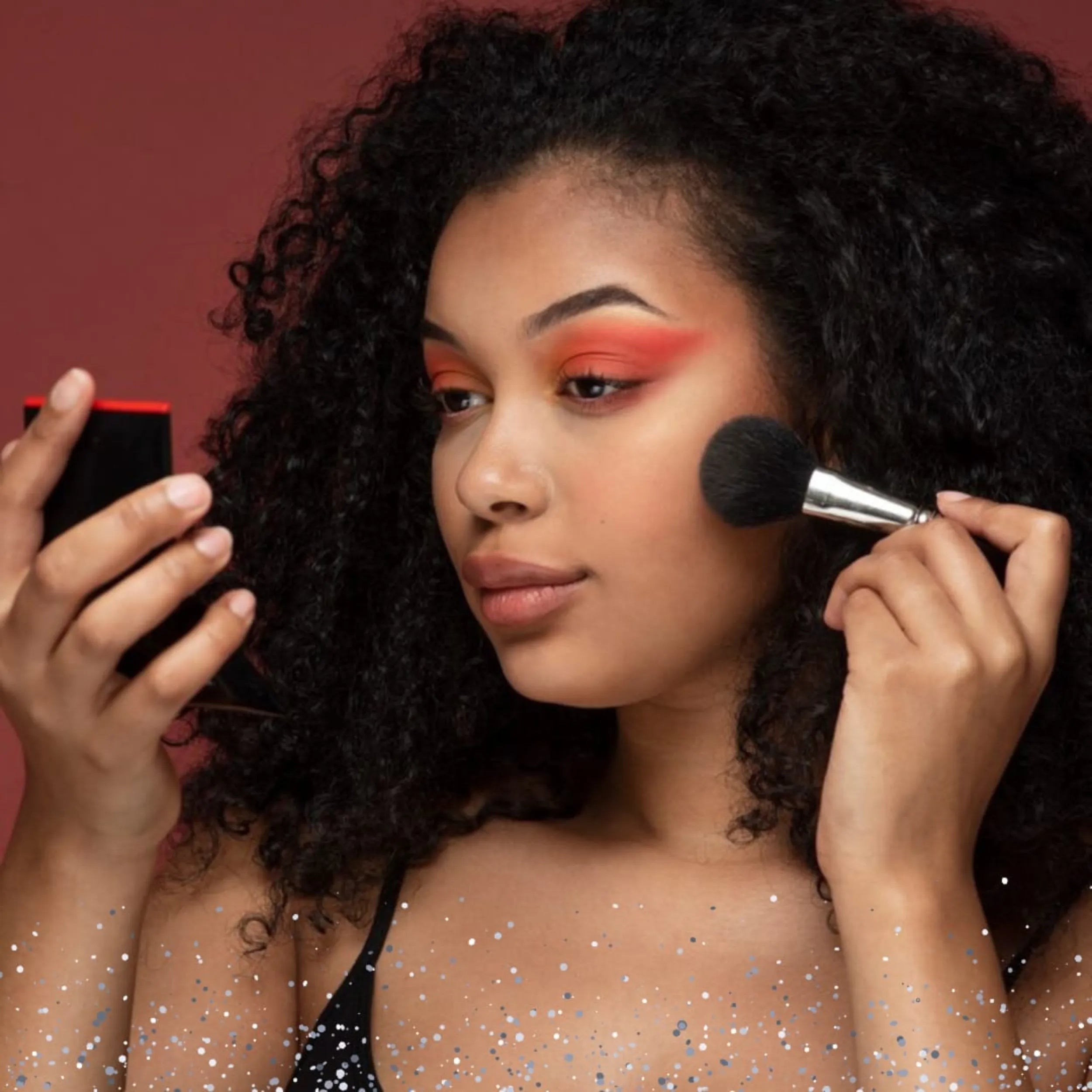 woman applying eyeshadow